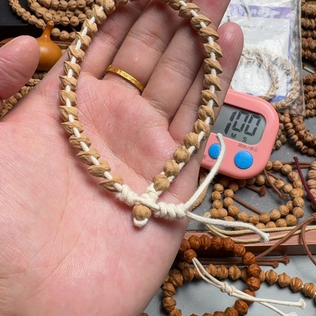 手串柏香籽/百香籽李**闪78