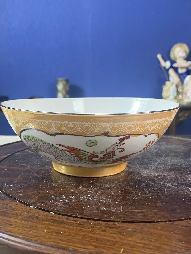 微瑕慎拍景德镇窑龙凤罗汉碗