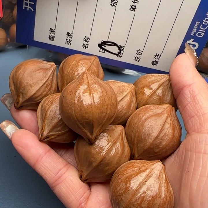 莫***孩手串橄榄核橄榄核