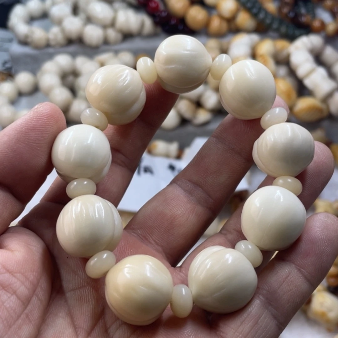 吊坠菩提根/象牙果全品象牙果拉丝屁桃卡20手串