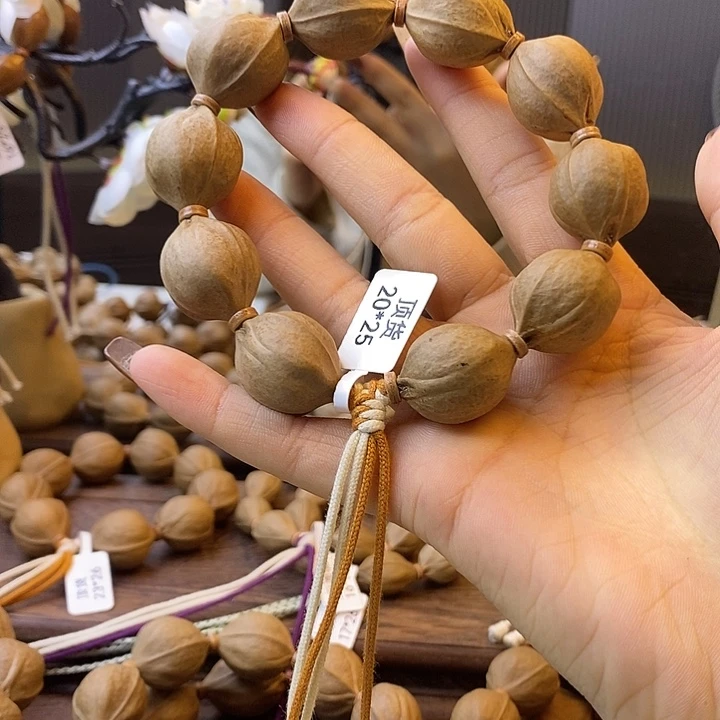 啥***是橄榄核吊坠梅林铁核
