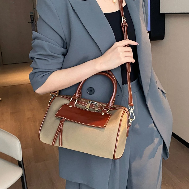 秋冬新款真皮波斯顿枕头包时尚休闲手提包牛皮配帆布单肩斜挎女包