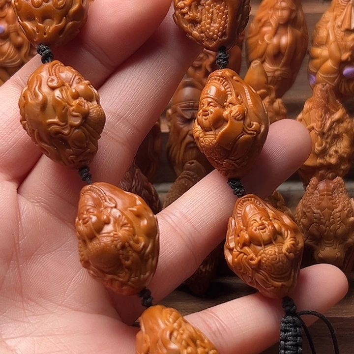 萌***橄榄核吊坠橄榄核