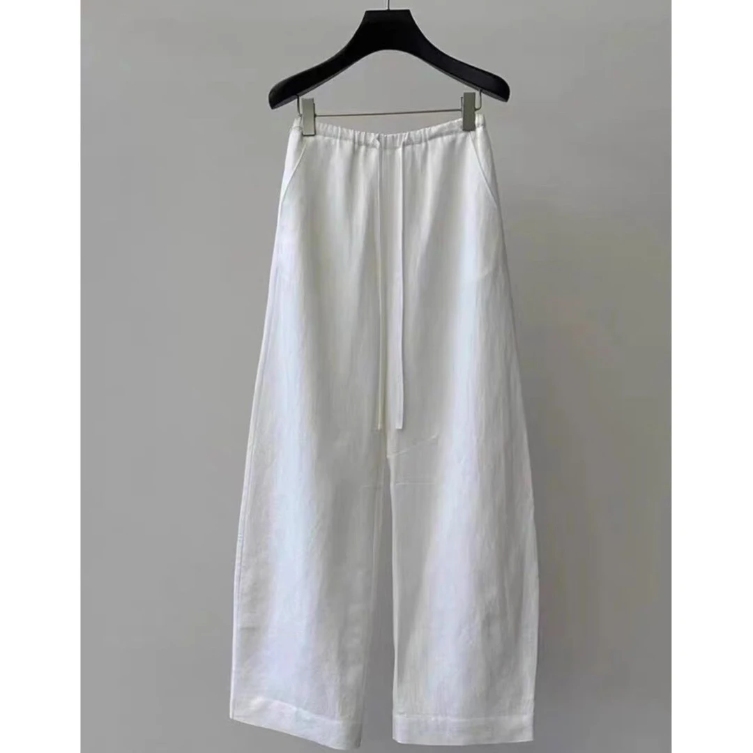 极简风白色休闲裤时尚镰刀阔腿裤松紧腰设计直筒长裤棉麻香蕉裤