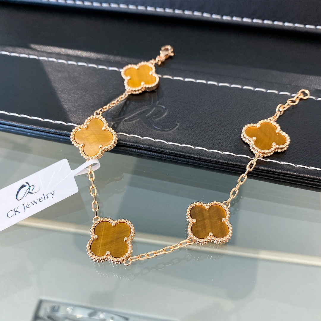 钛钢石英石手链 5花片   双面虎牙石幸运草手链 B1407