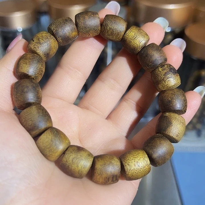 沉香沉香碎屑九九沉鼓珠单圈乌身圆叶1.214