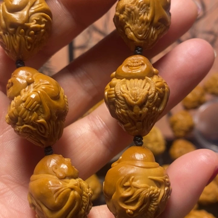 橄榄核手串/手链广****筋瑞兽米勒