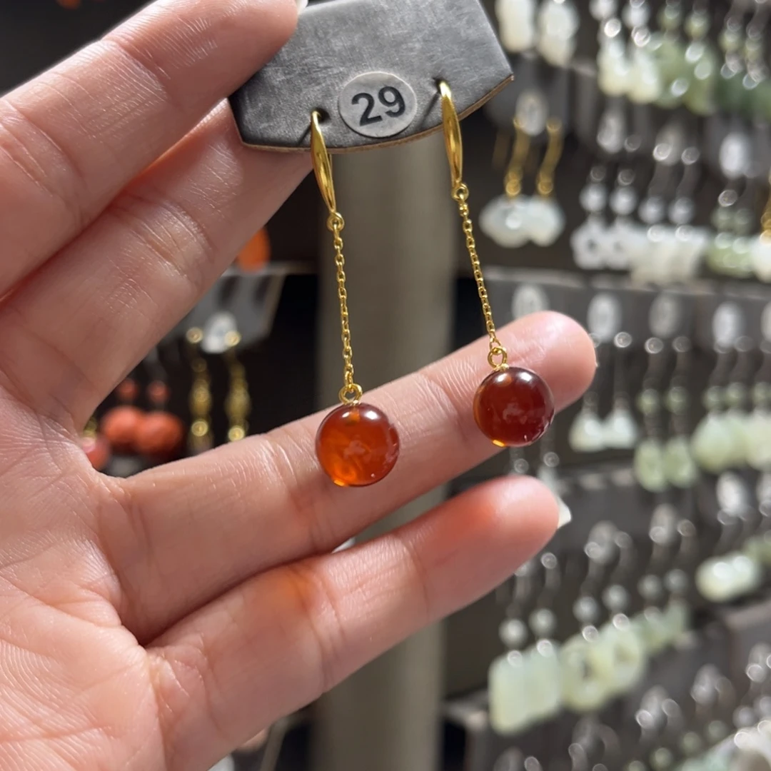 吴***酒琥珀银S925镀金镶嵌耳饰