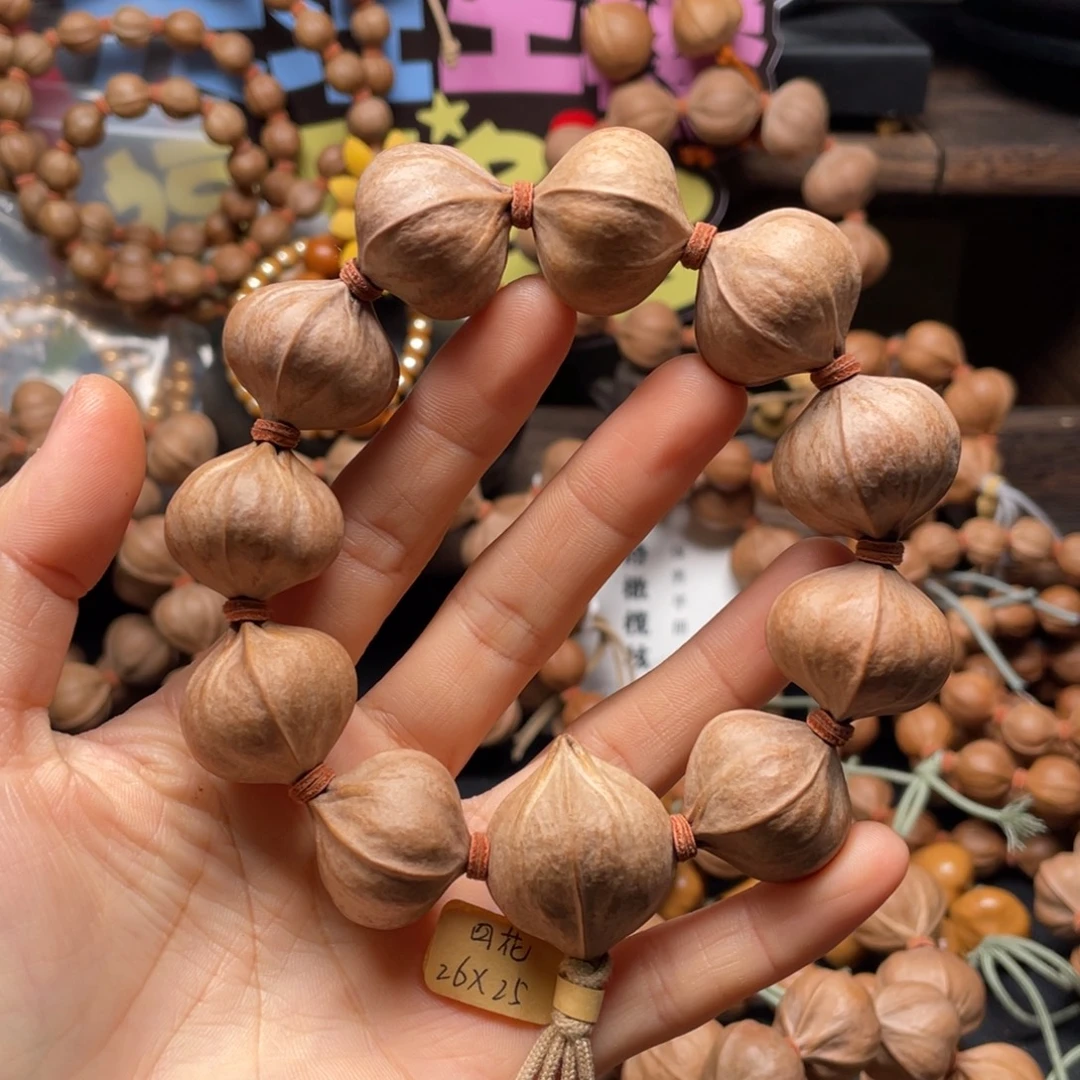 汪***仙吊坠橄榄核2625四花铁核