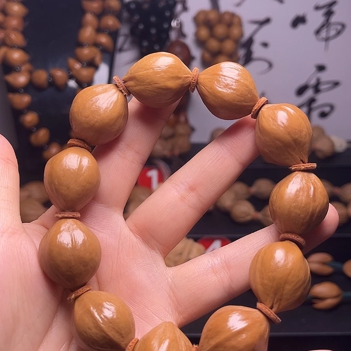 橄榄核手串蜜桃臀20.25