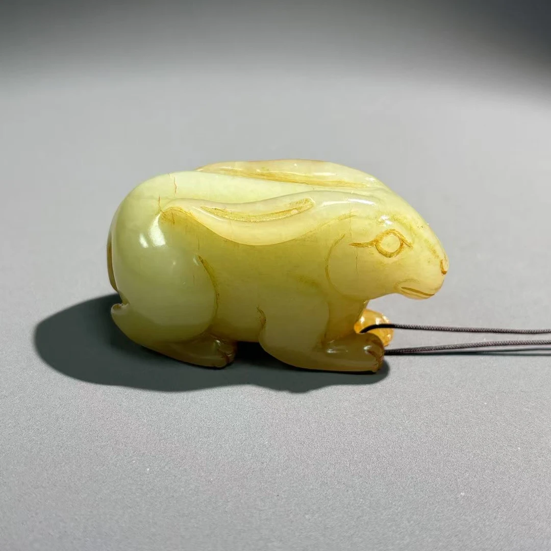 清代黄玉和田玉玉兔把件