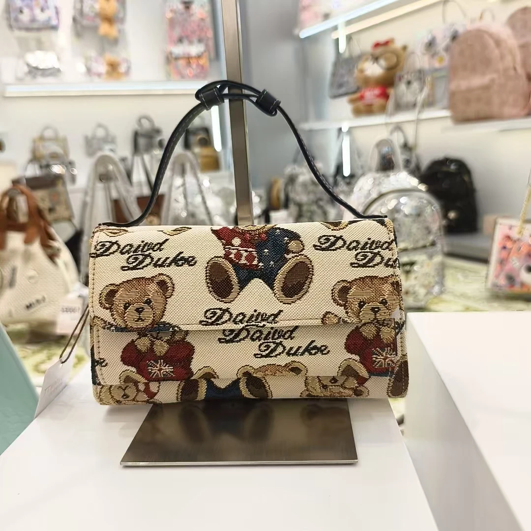 小田姐姐 【维尼熊】 新款手提包  A10129  1154国旗宝蓝