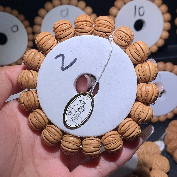 天***光桃核手串头货金丹