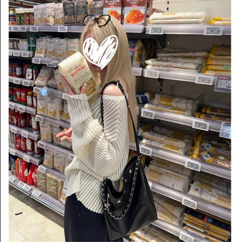 早春新款纸片人坑条微透视慵懒辣妹毛衣宽松显瘦夏季防晒镂空上衣