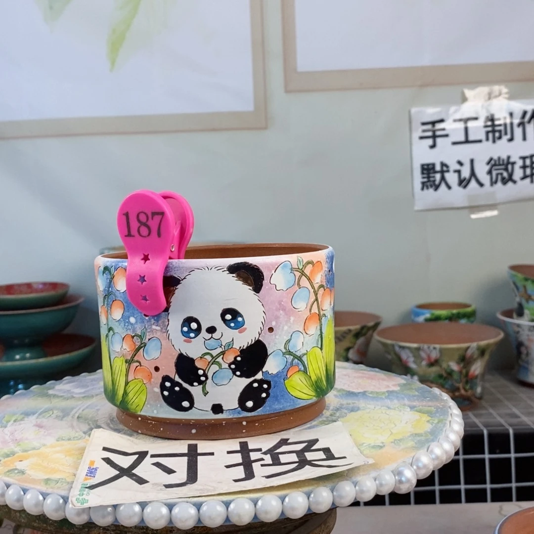 紫砂花盆知****?红陶手绘花盆