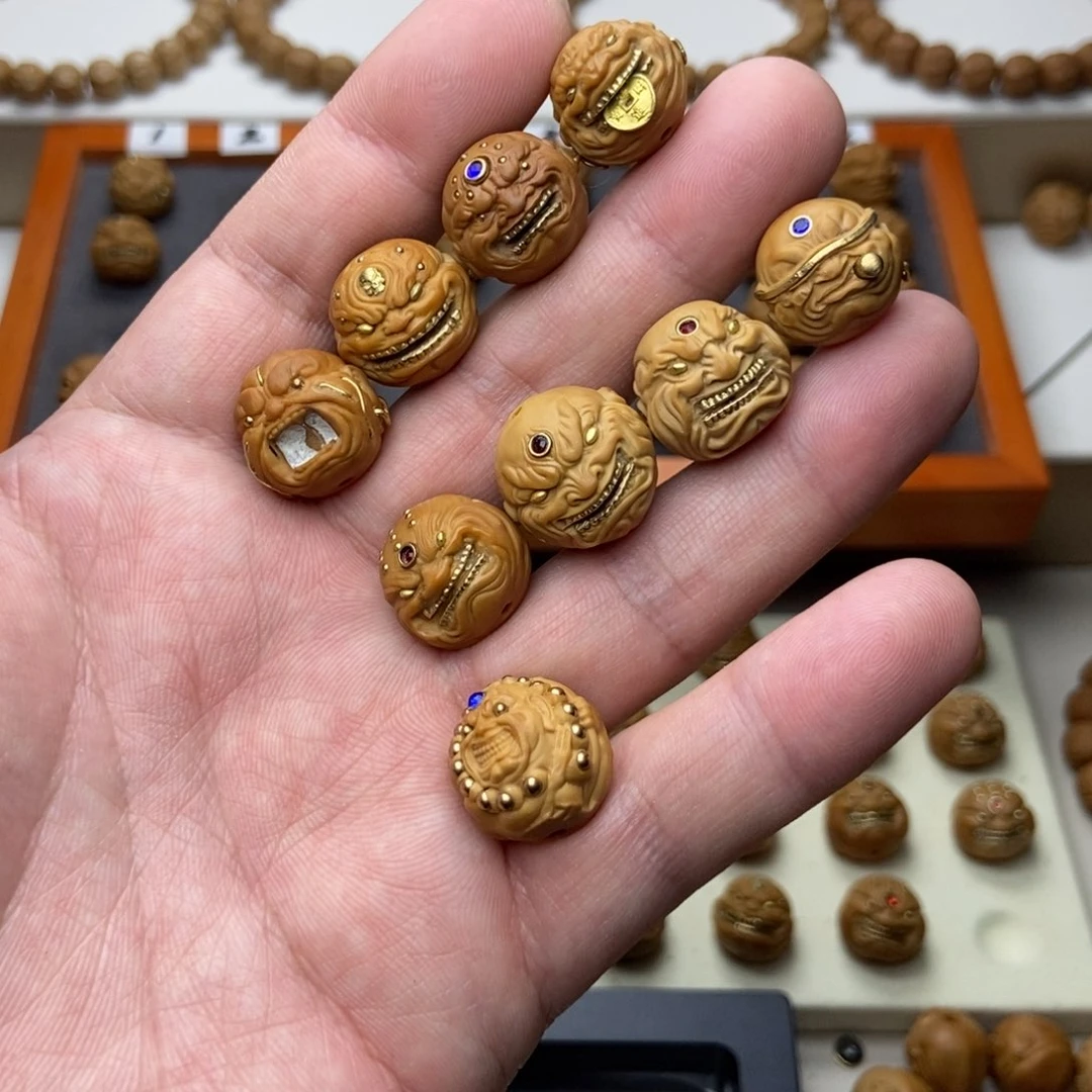 文玩核桃吊坠?猴头核桃单颗雕刻镶嵌