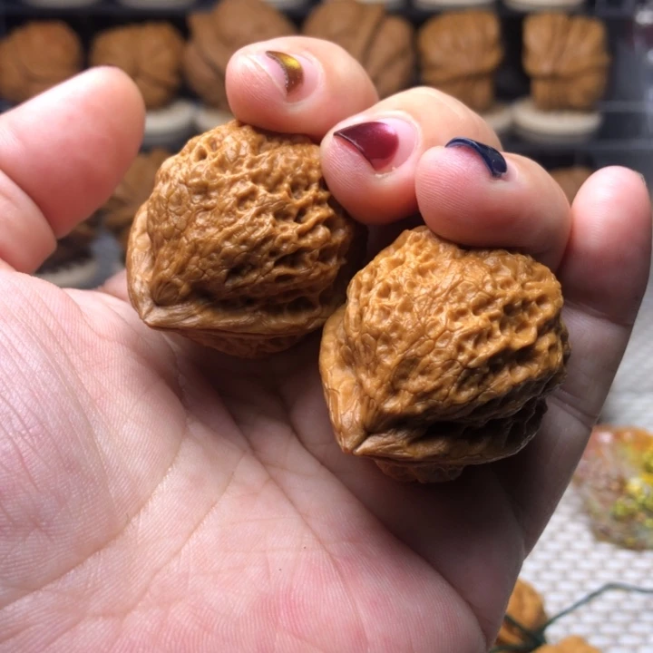 文玩核桃把件50寿桃35尺