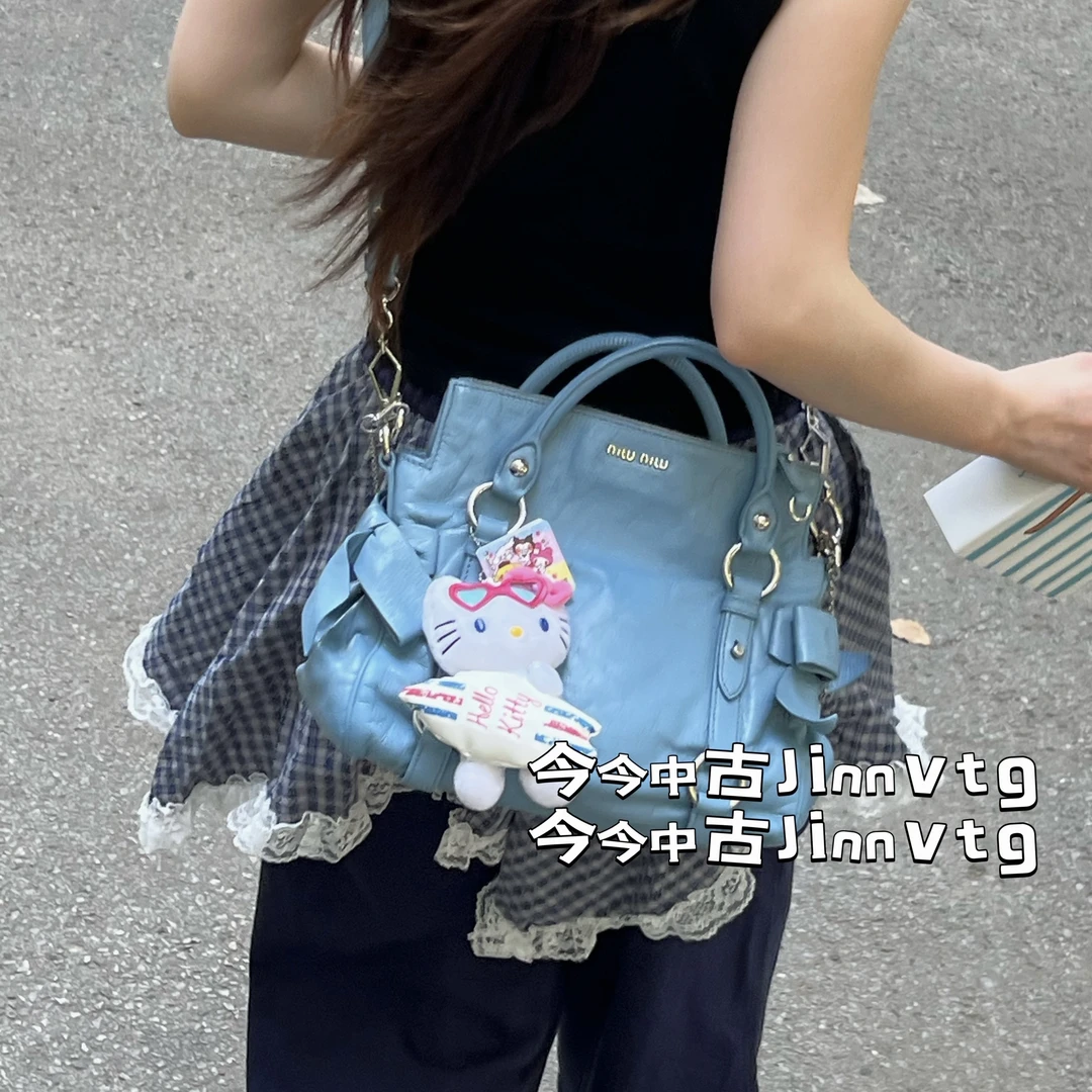 95新 MIU MIU/缪缪 蓝色油蜡皮蝴蝶结机车单肩斜挎包