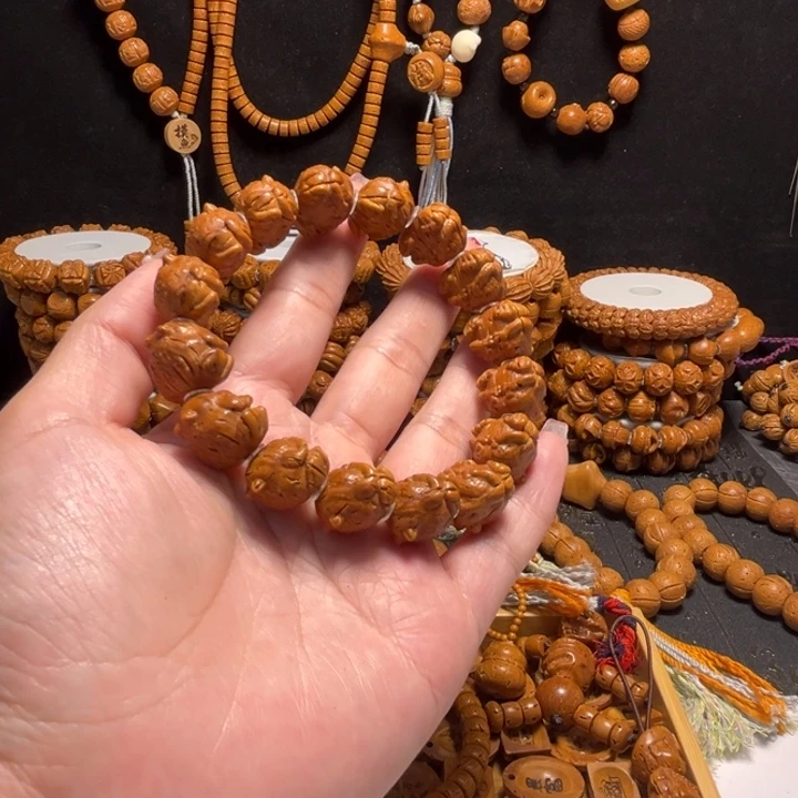 凤***凶桃核手串呱呱来财手串