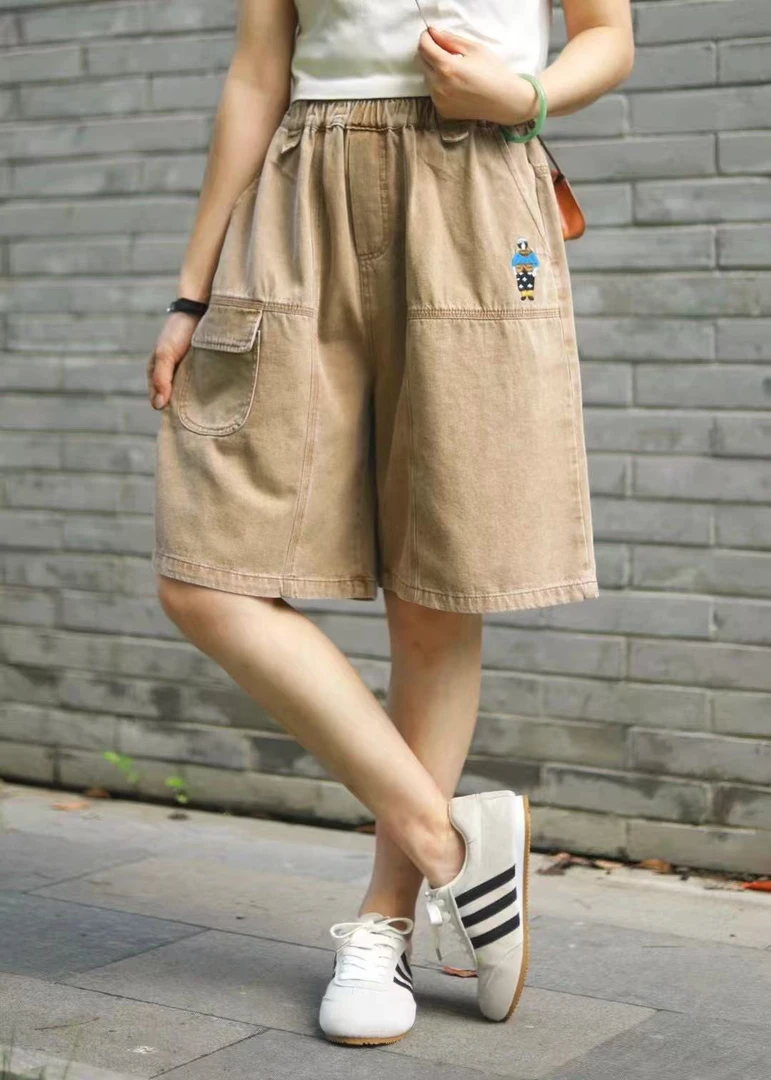 (浅笑）23075-1刺绣小人女宽松大码显瘦个性时尚百搭五分牛仔裤