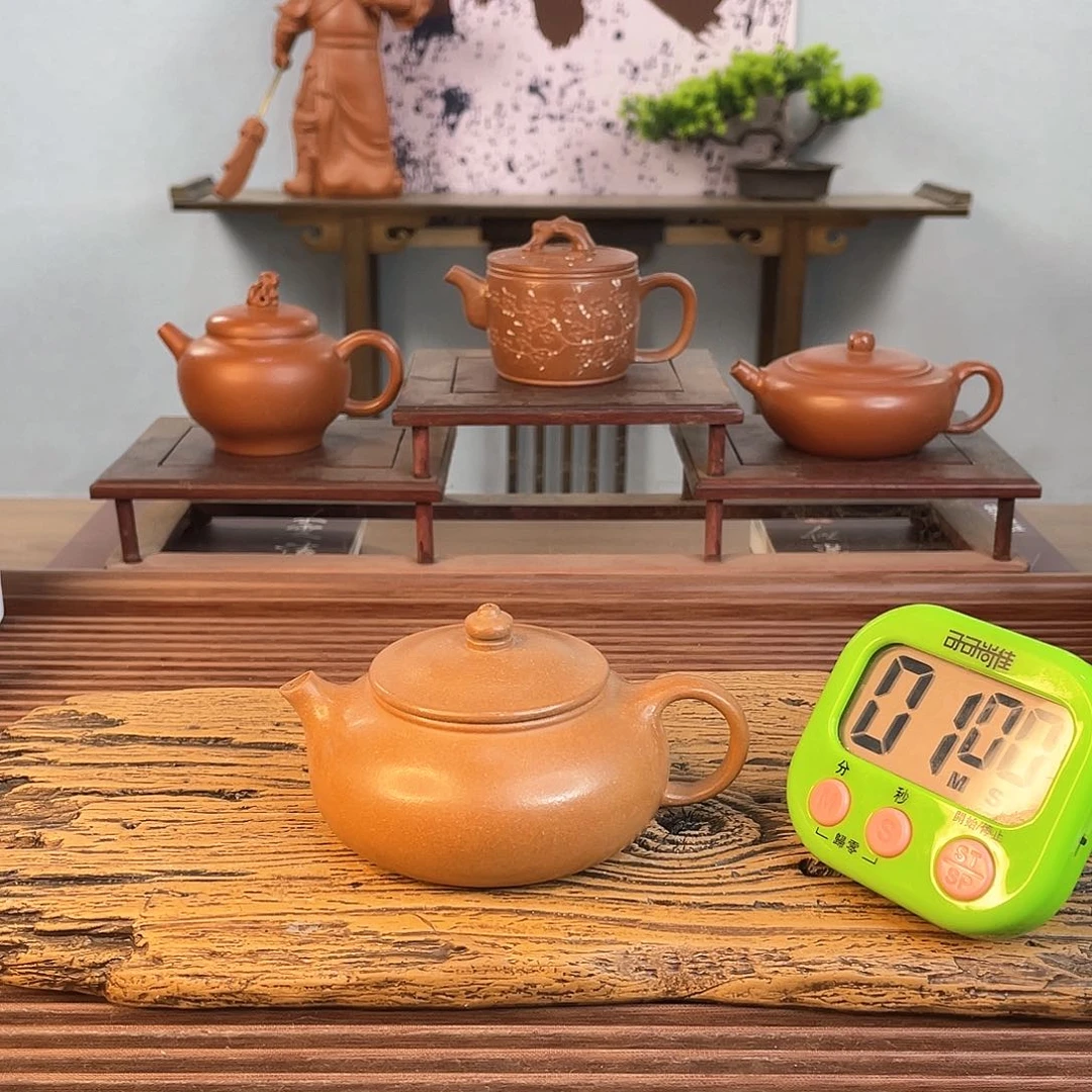 紫砂茶壶癸*在下的是几点钟去