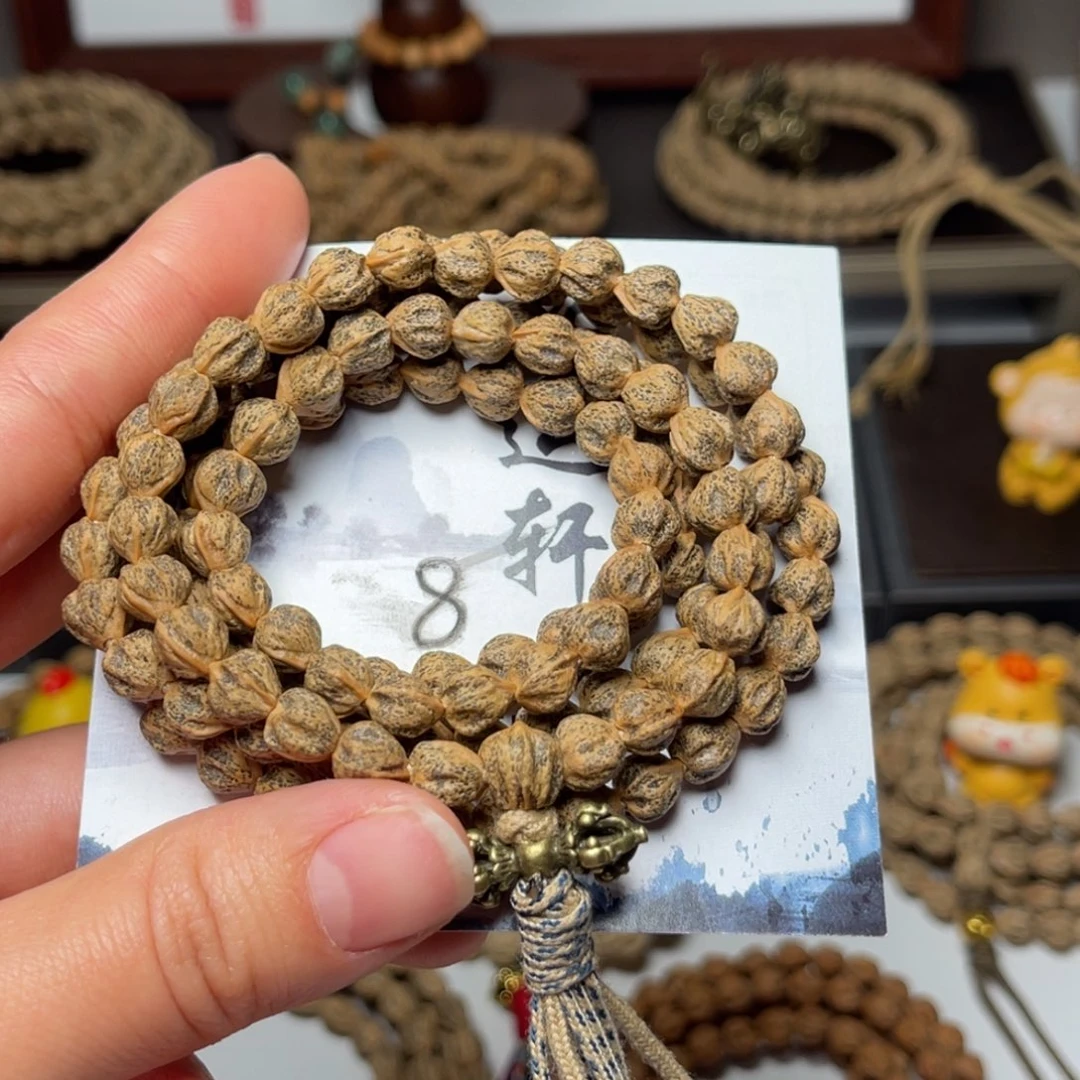 郝***销柏香籽/百香籽吊坠