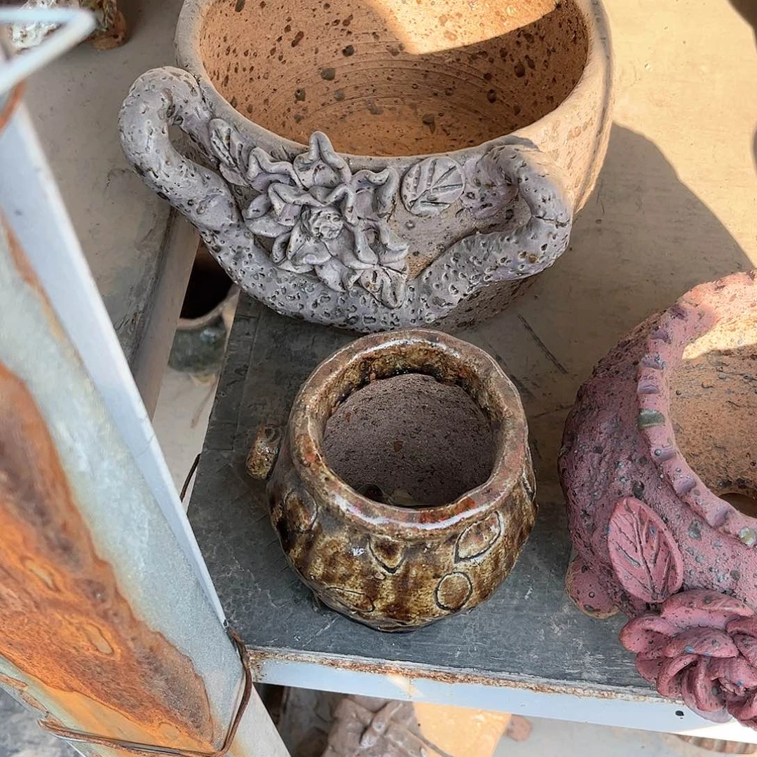 泥塑就**事古镇炻陶瑕疵