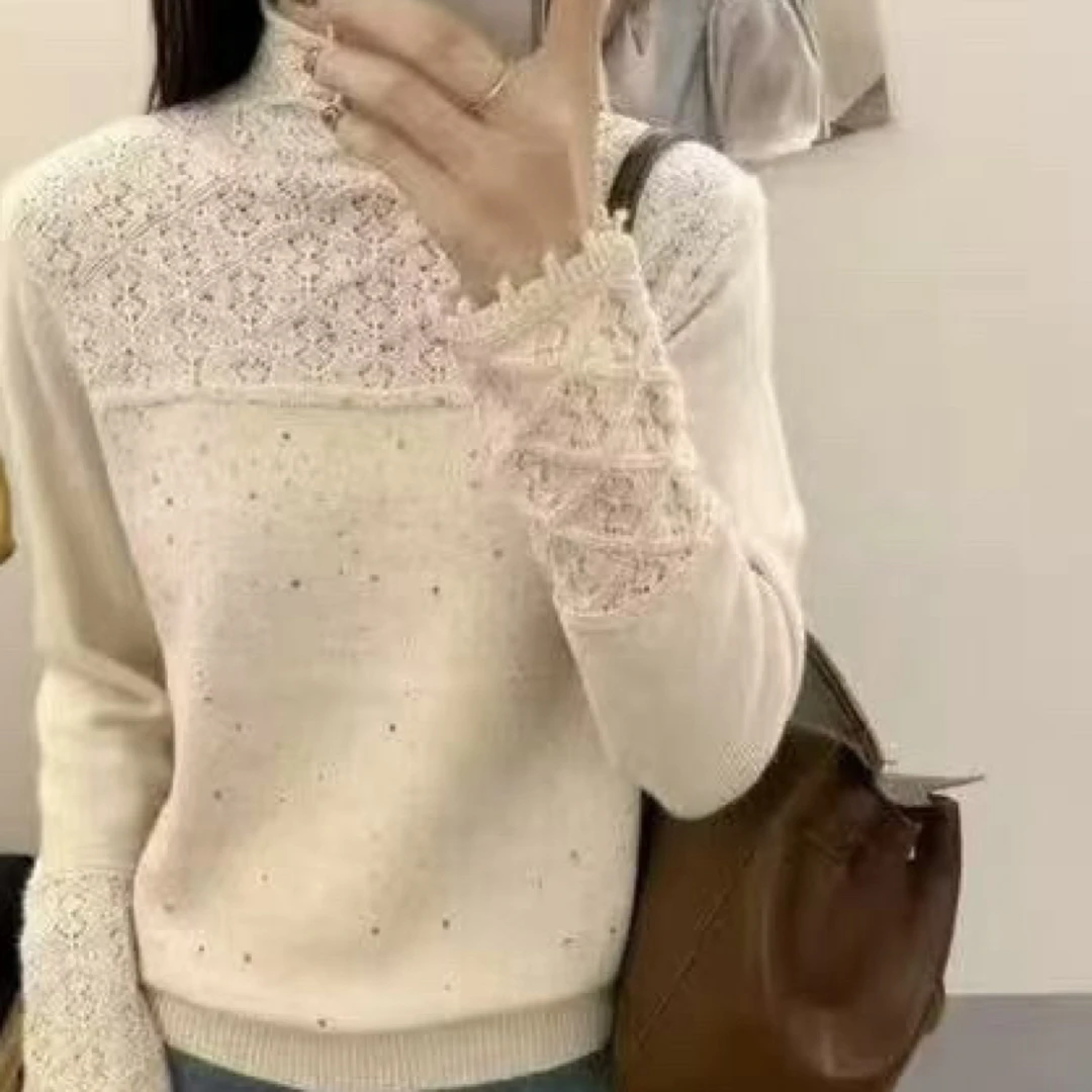 时尚勾花烫钻毛衫
