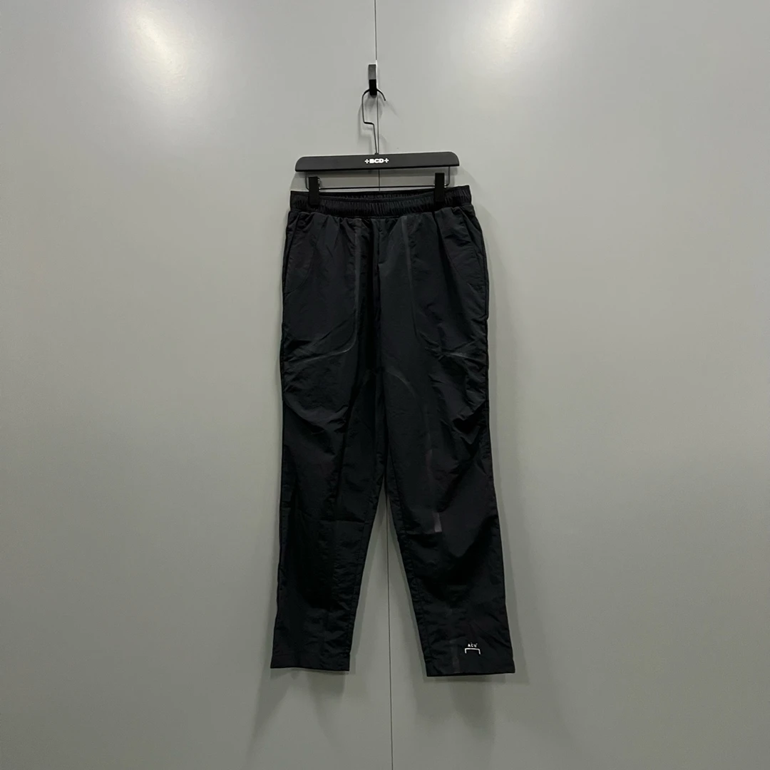 99新  （cc1） 黑色胶条拼接长裤 S码/ bc006738