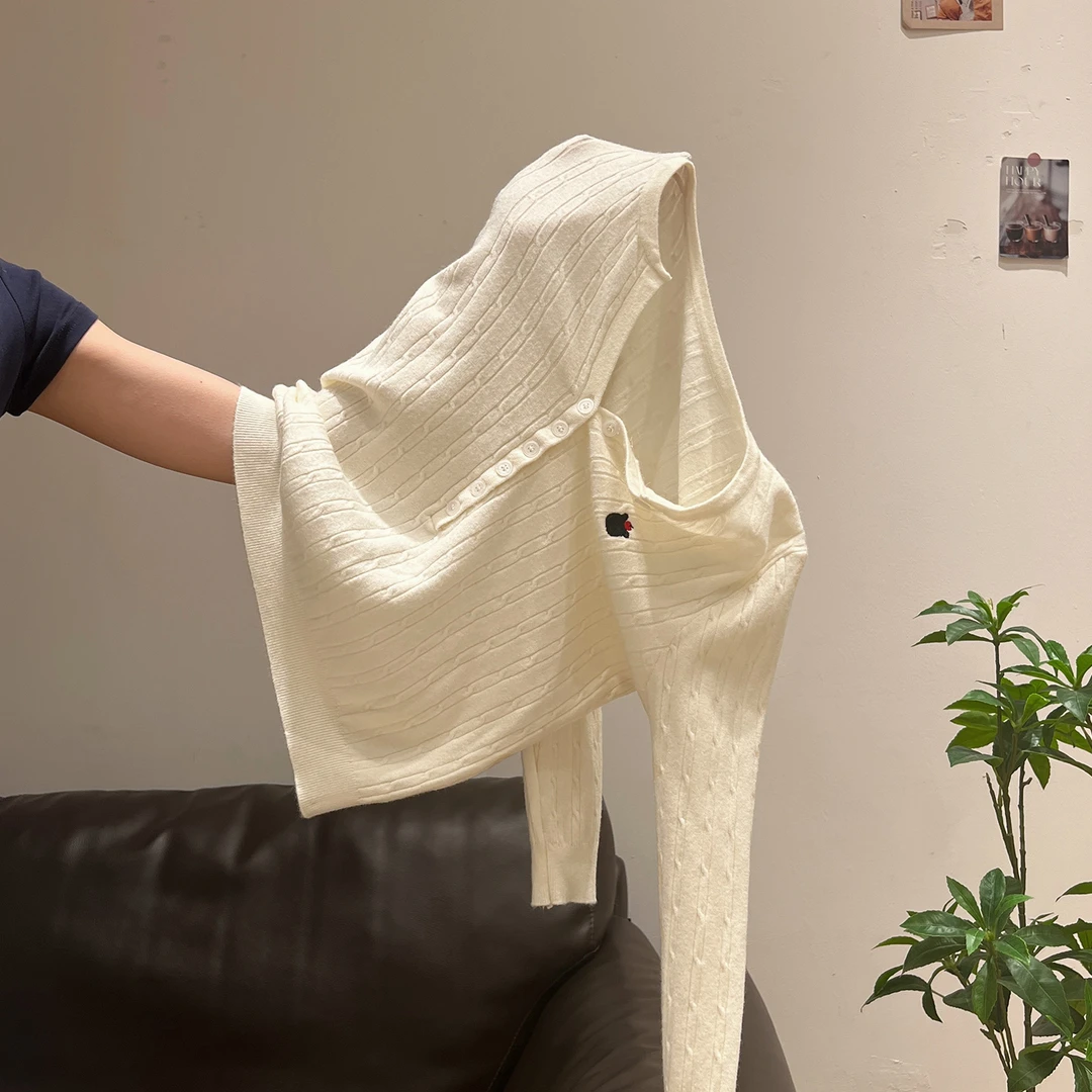 白色半开领刺绣长袖针织衫女2026秋季新款纽扣设计感修身显瘦上衣