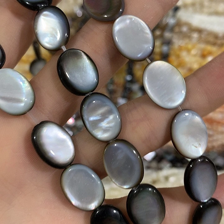 12mm黑叠贝抛面椭圆一条