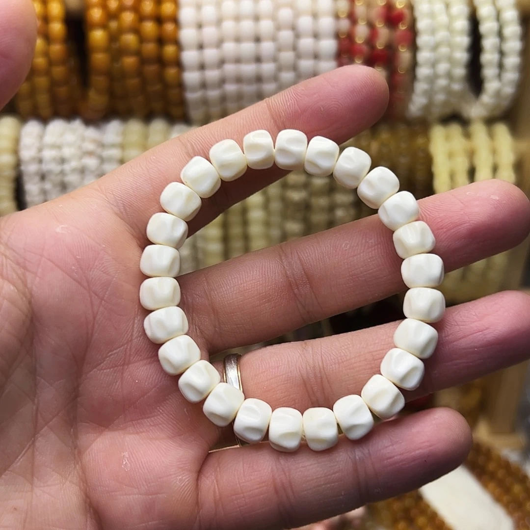 桃核把件0.9鹿角百香籽