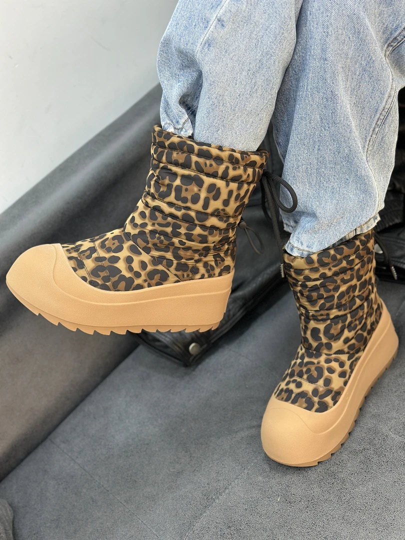 萝茜妮嫚秋冬新款时尚休闲真毛保暖一脚蹬圆头英伦厚底百搭雪地靴