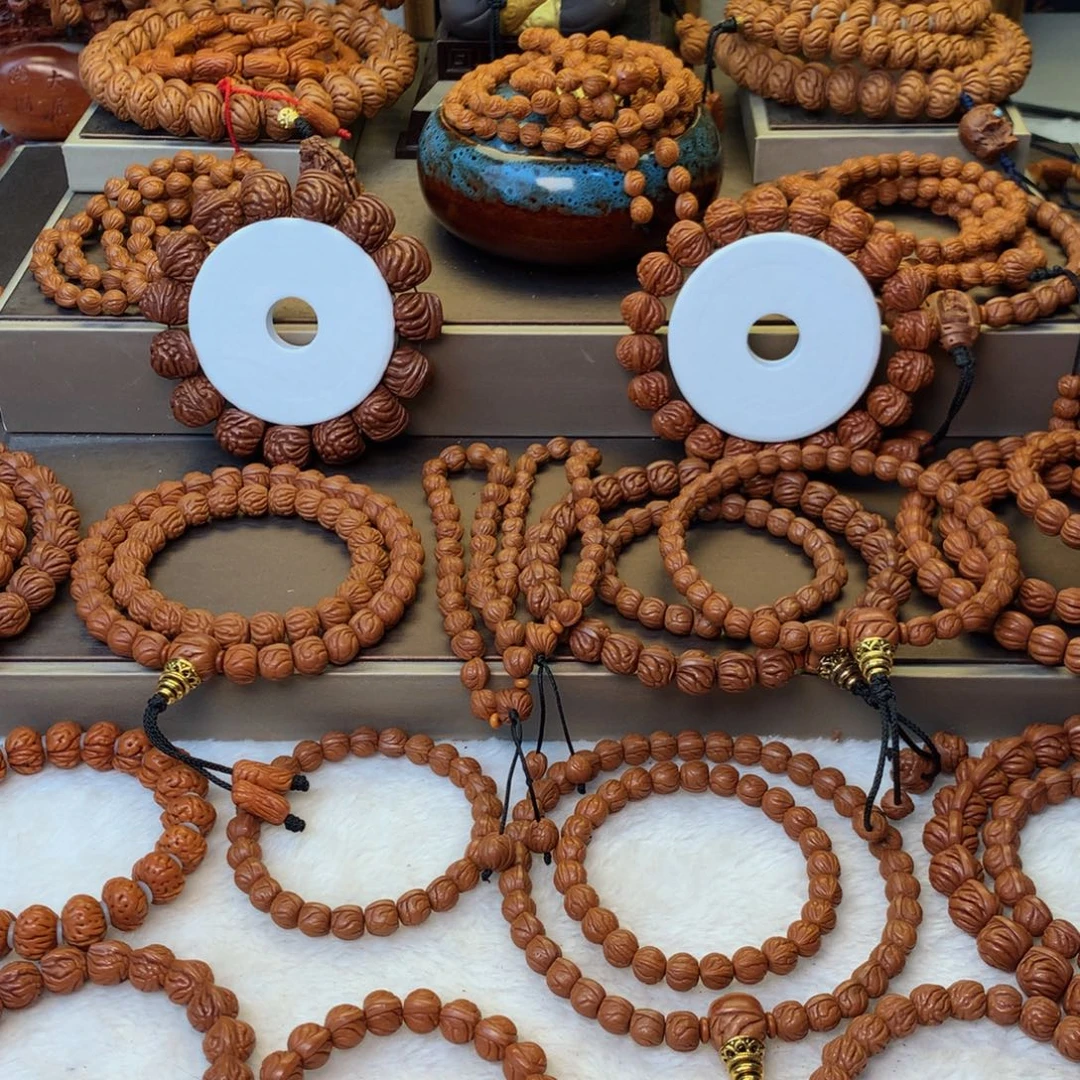 长***队桃核手串秦岭龙纹