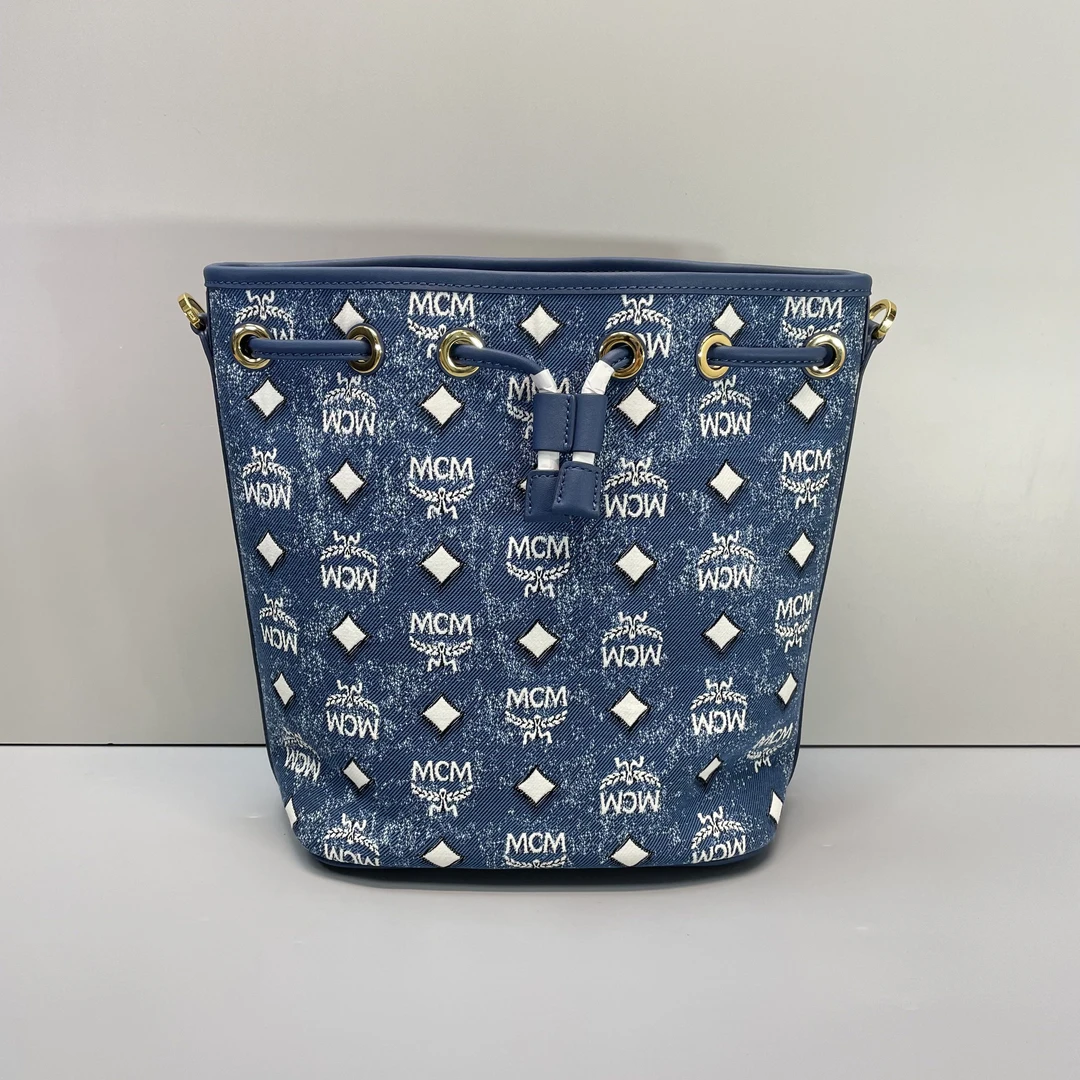 99新 MCM 媚姐/mcm新款蓝色织物水桶包21x25x12cmG020407