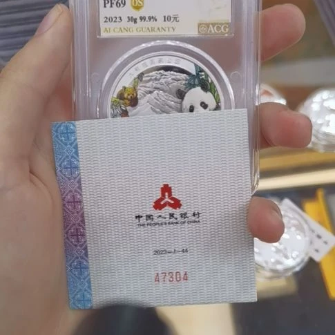 鱼***u纯银大熊猫公园纪念币