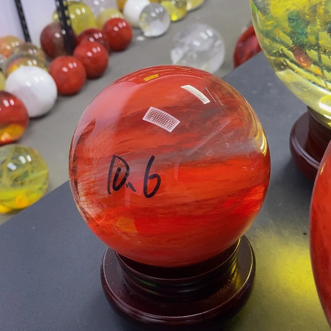 亿***品石材10.6厘米红水摆件