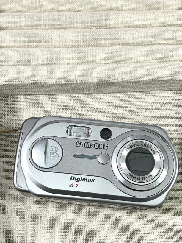 9新  三星 a5 银色 特价 复古ccd数码相机 用五号电池