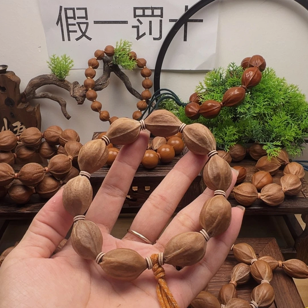 A***z橄榄核手串18.25梅林铁核