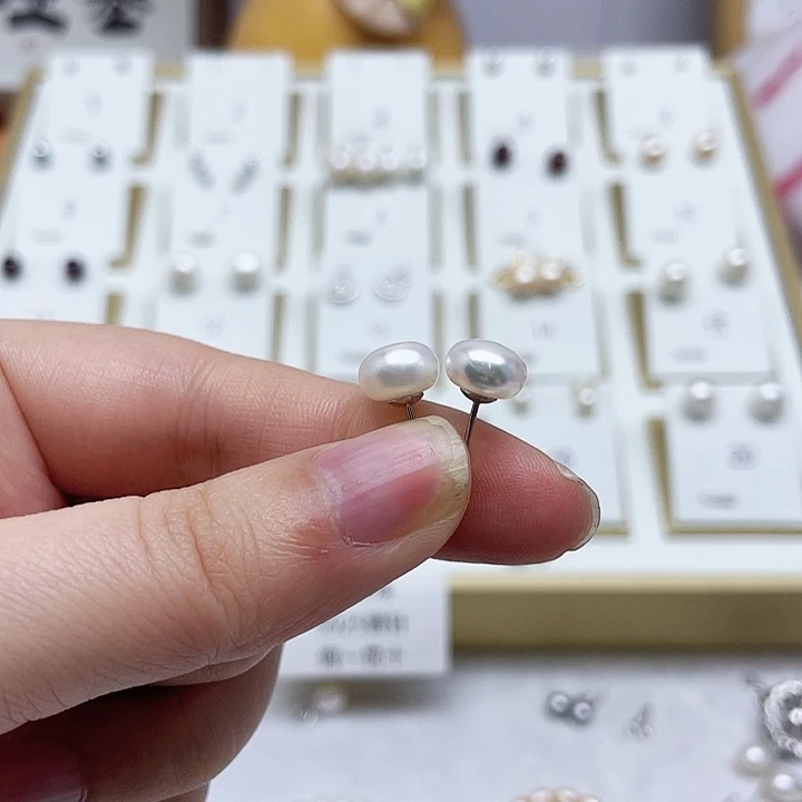 淡水珍珠耳饰银S925镶嵌怪**?