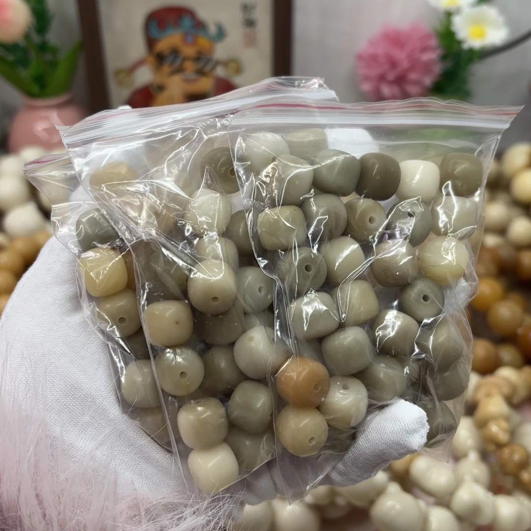 菩提根/象牙果吊坠13干磨瑕疵燕麦奶咖桶散珠30颗一锅267