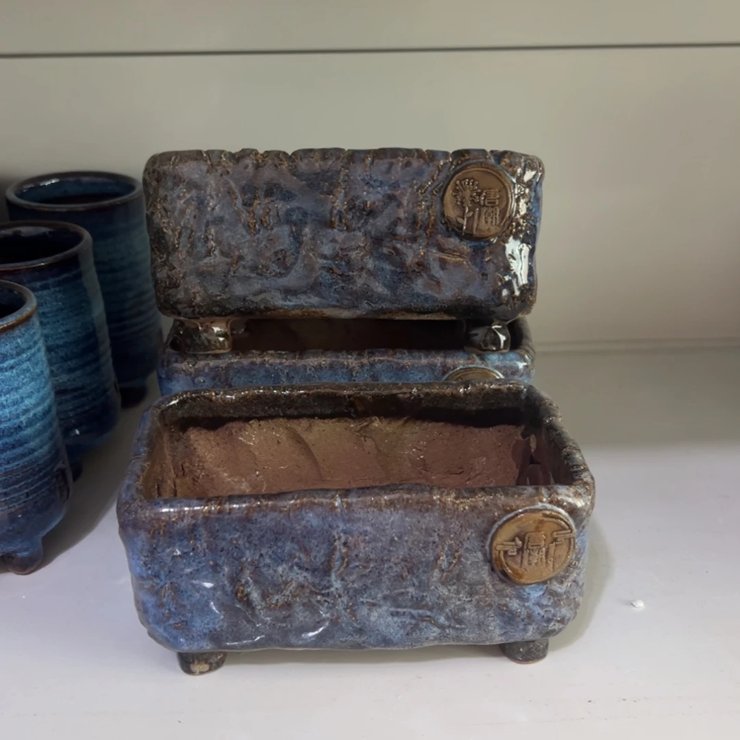 红陶一****q唐朝多肉花盆