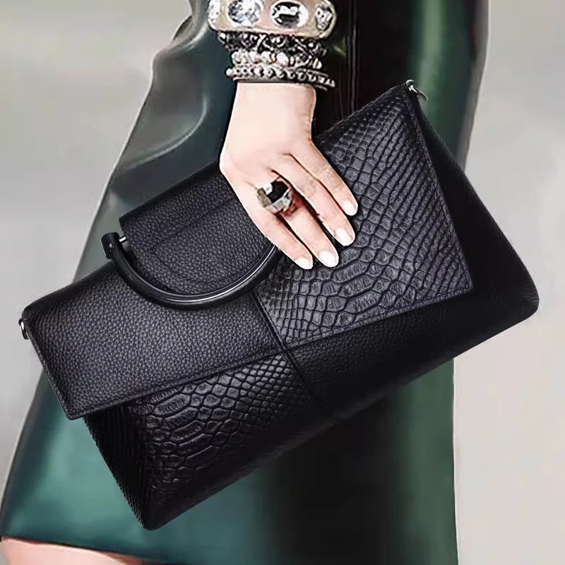真皮手拿包女式2025新款精致高档高端手包女士手提手抓斜挎小包包