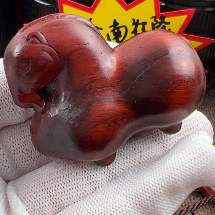 木海南红降黑金马瑕疵