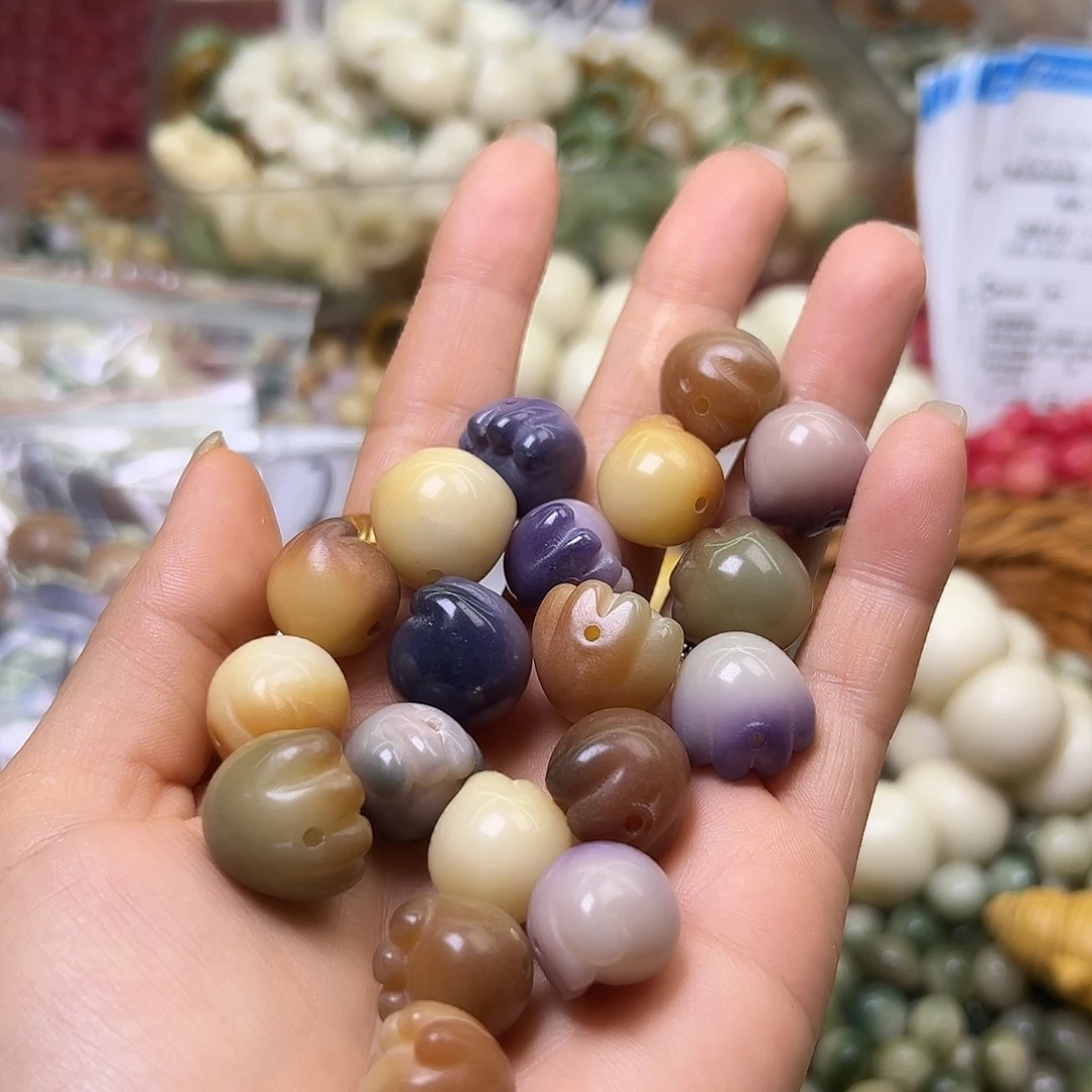 菩提根/象牙果手串微瑕多宝猫爪15颗17的
