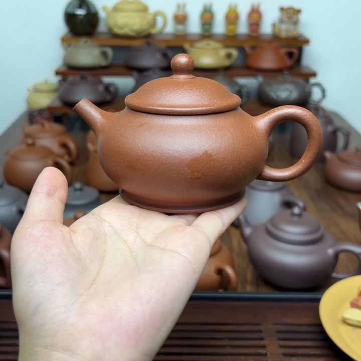 ****糖紫砂1潘壶。    200cc
