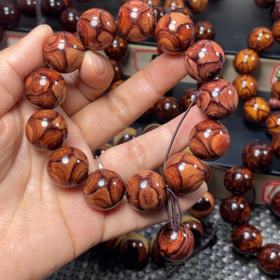 韩***三花梨木类1.8鬼脸对眼