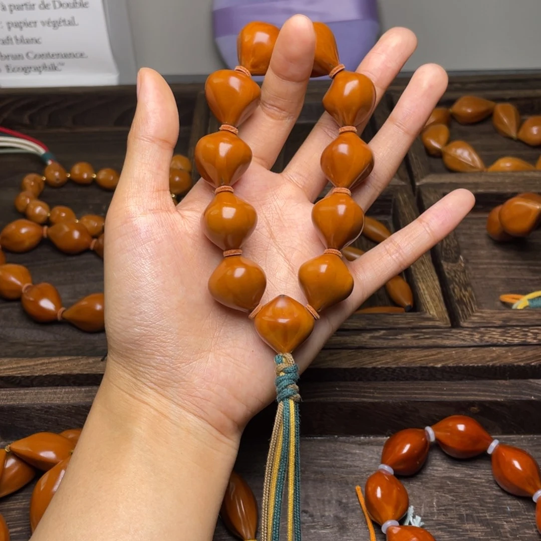 胜***子橄榄核手串橄榄核手串三通款