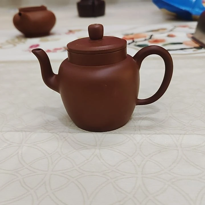 茶壶紫砂摸着也约有早