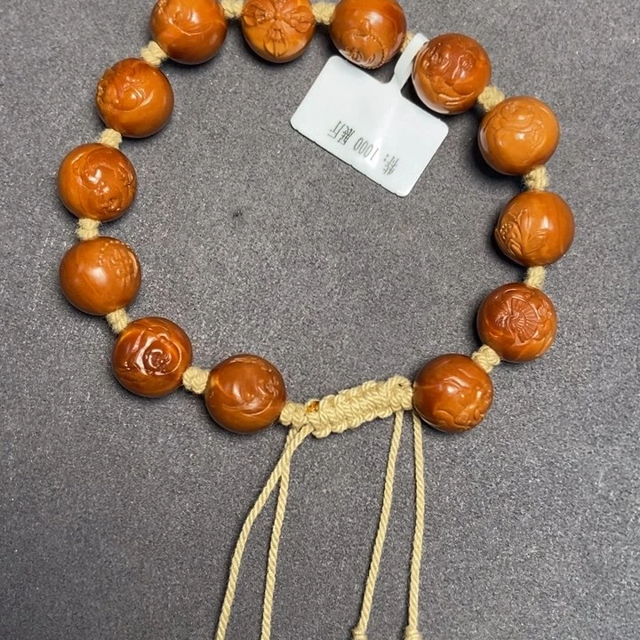 橄榄核手串/手链特价 1.3正圆浮雕弥勒手串